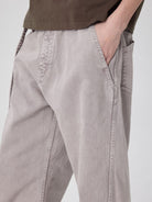 SIMPLE PROJECT Belted Garment Dyed Curved Jeans in Purple - On Model