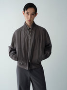 ROYA Matte Lyocell Blend Zip Jacket in Gray - On Male Model