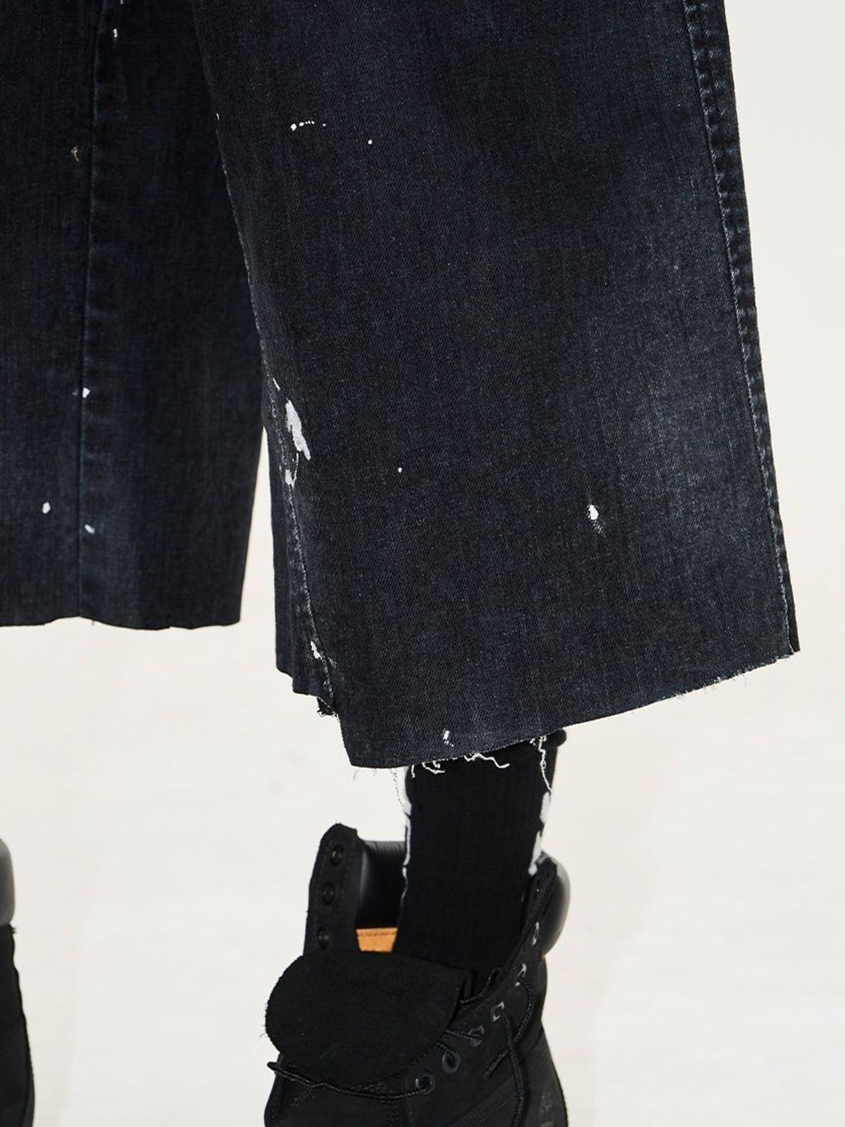 BLINDNOPLAN Ink Splatter Denim Carpenter Shorts in Black - On Model
