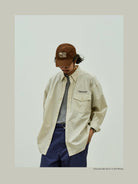 USAGE Oversized Micro Check Button Down Shirt in Cream - On Male Model