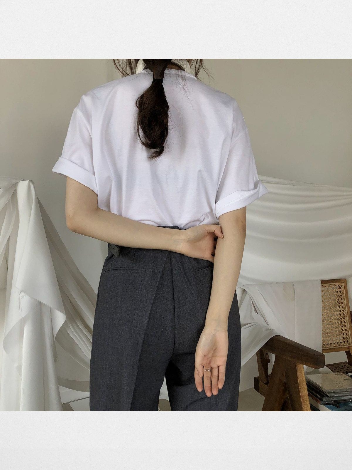 MASONPRINCE Pleated Wide Leg Trousers in Gray - On Female Model