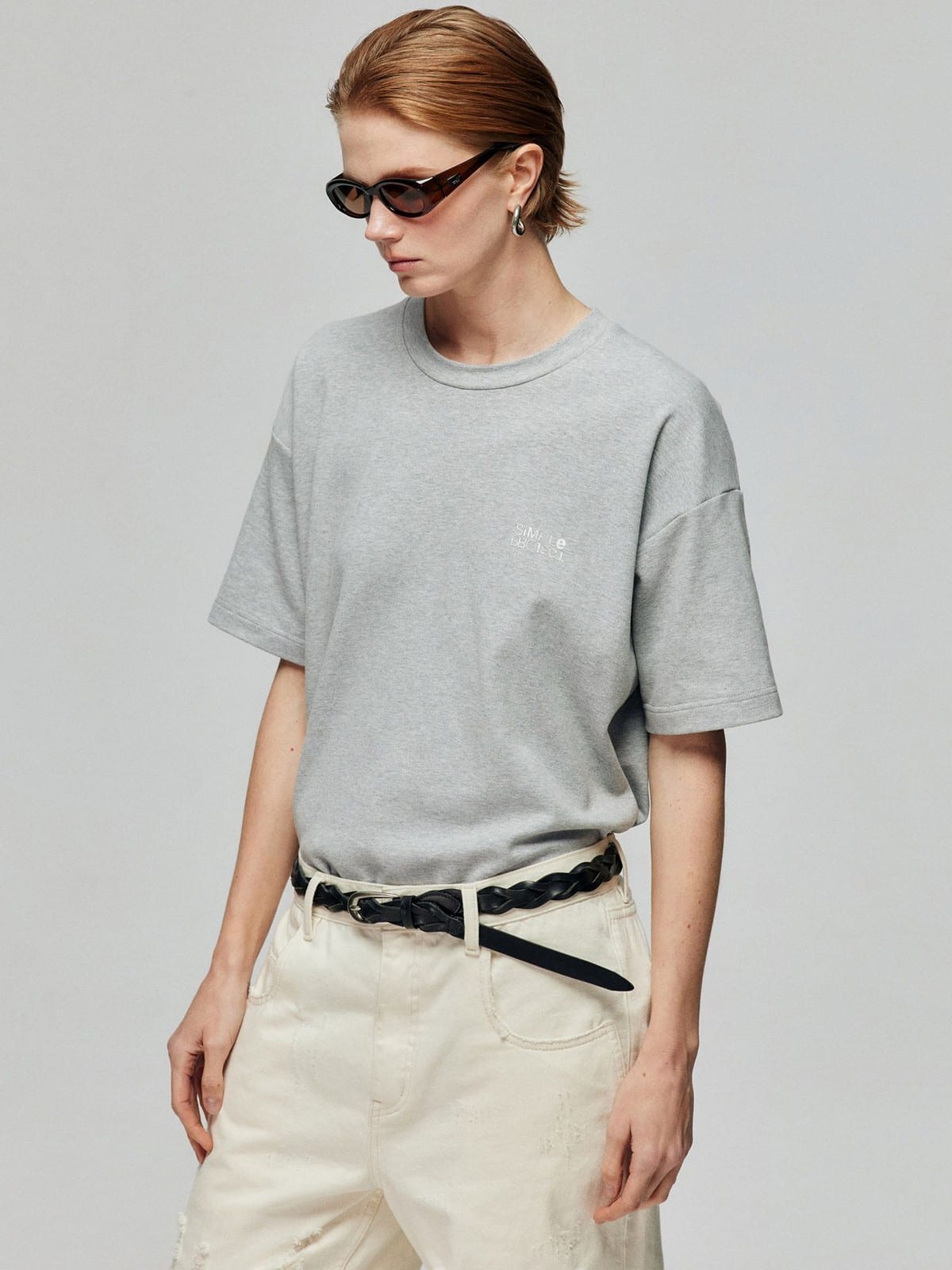 SIMPLE PROJECT Inverted Silver Logo Crewneck T Shirt in Gray - On Female Model