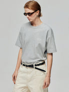SIMPLE PROJECT Inverted Silver Logo Crewneck T Shirt in Gray - On Female Model