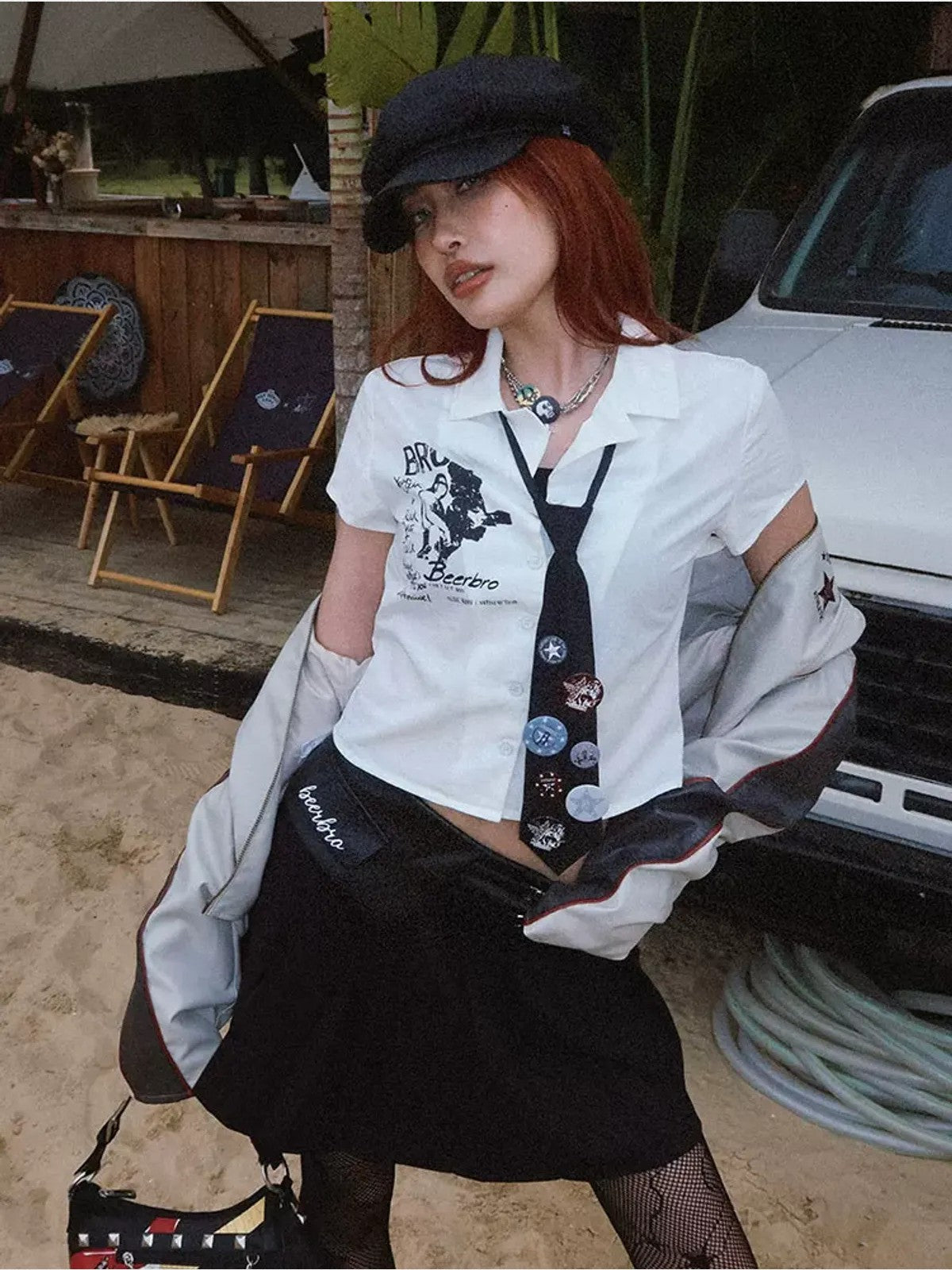 BeerBro Preppy Graphic Badge Necktie in Navy Blue - On Female Model