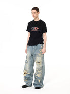 UNKNOWNWORLD Heavyweight Distressed Wide Leg Jeans in Blue - On Female Model
