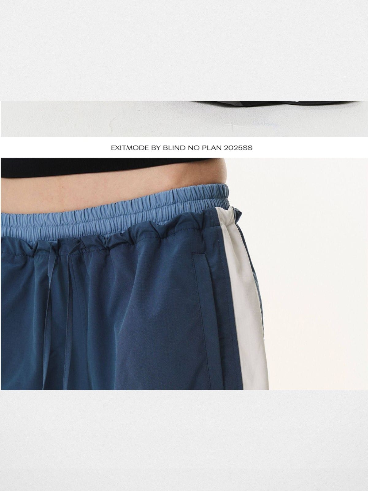 BLINDNOPLAN Contrast Panel Pleated Parachute Pants in Blue - On Model