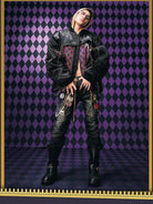 MEDM JoJo Collab Graphic Puffer Bomber in Black - On Male Model