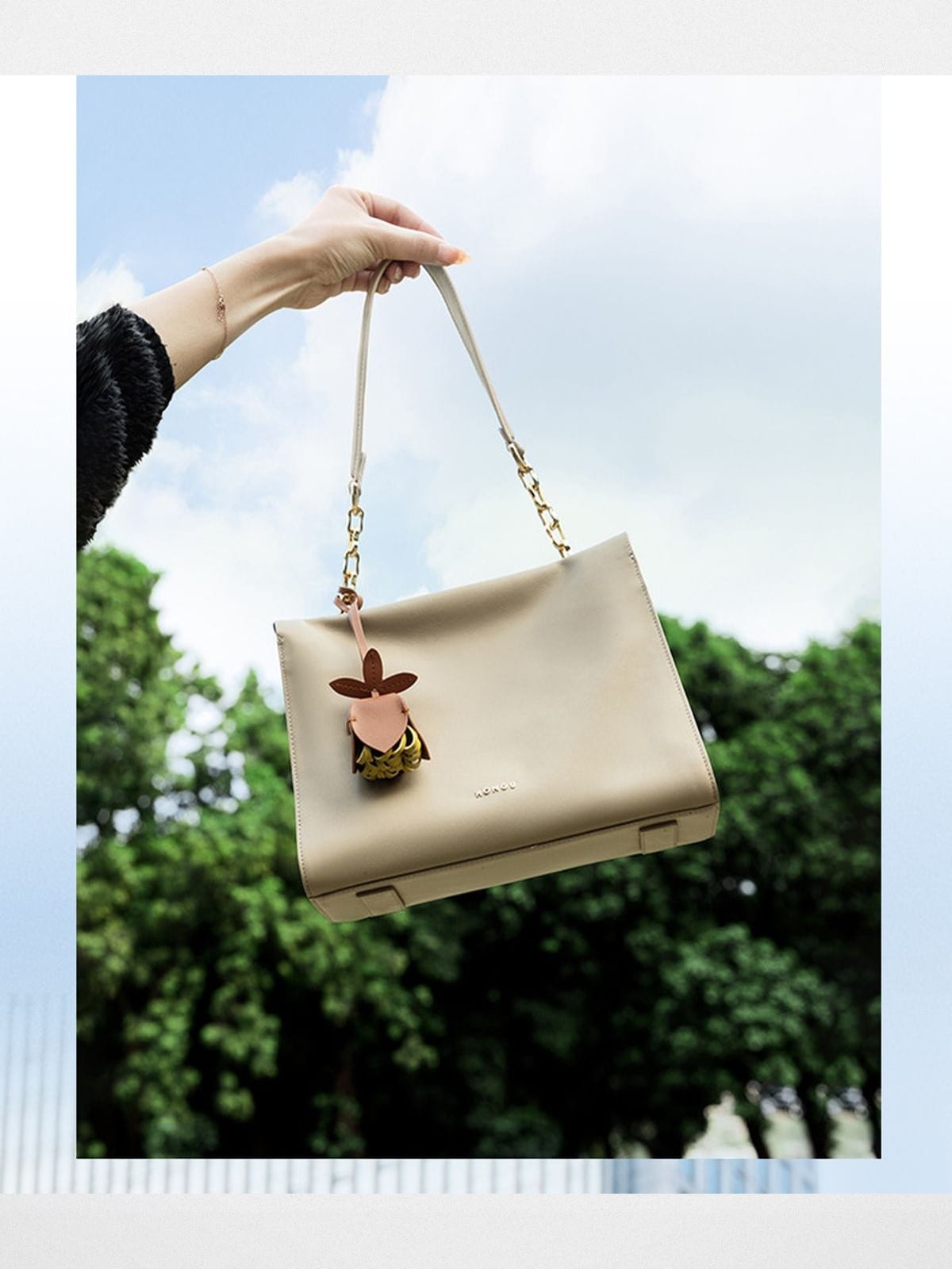 HONGU Cowhide Leather Shoulder Bag in Beige - On Female Model