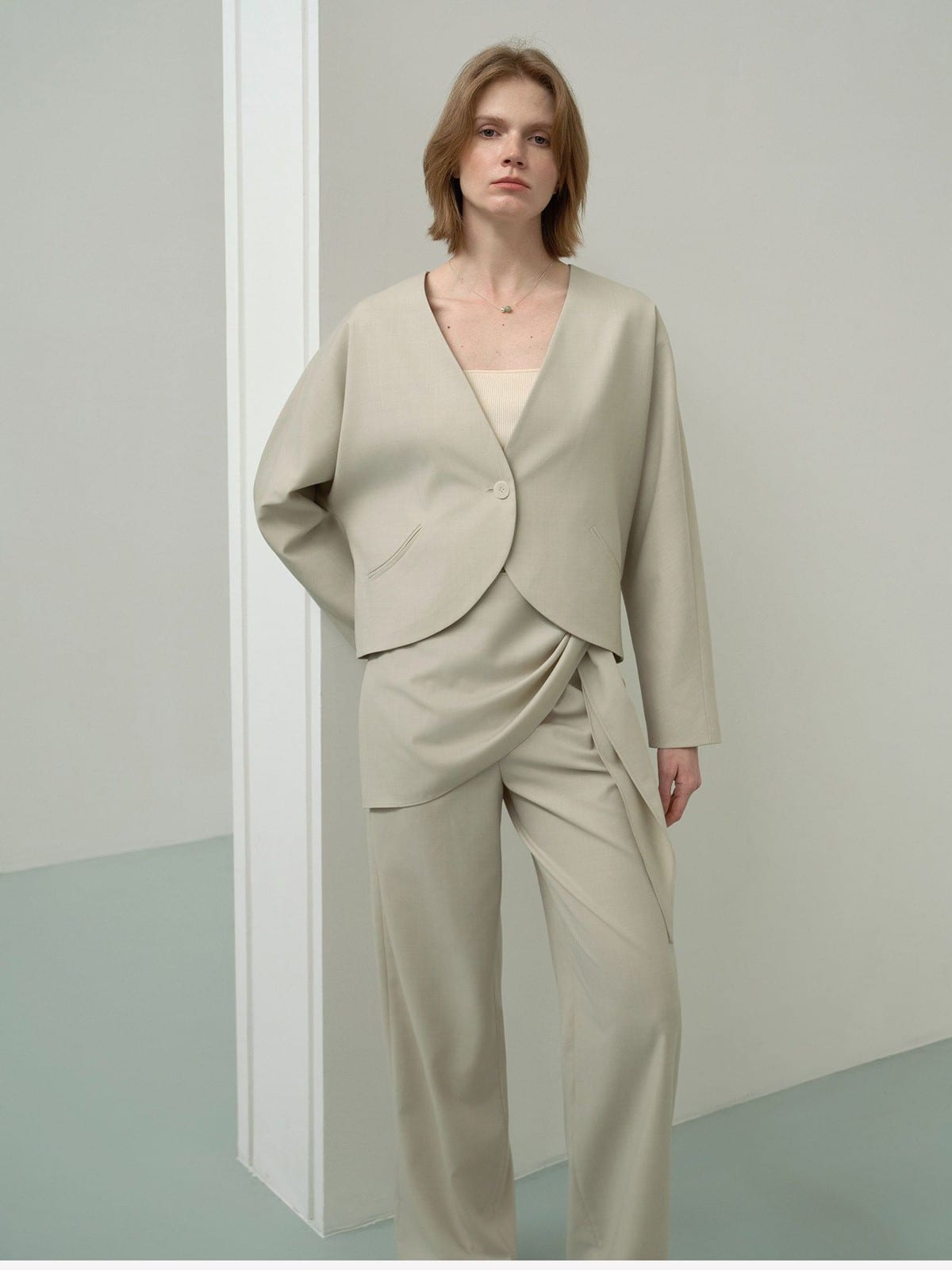 TEASEL Scalloped Edge Wool Blend Cropped Blazer in Green - On Female Model