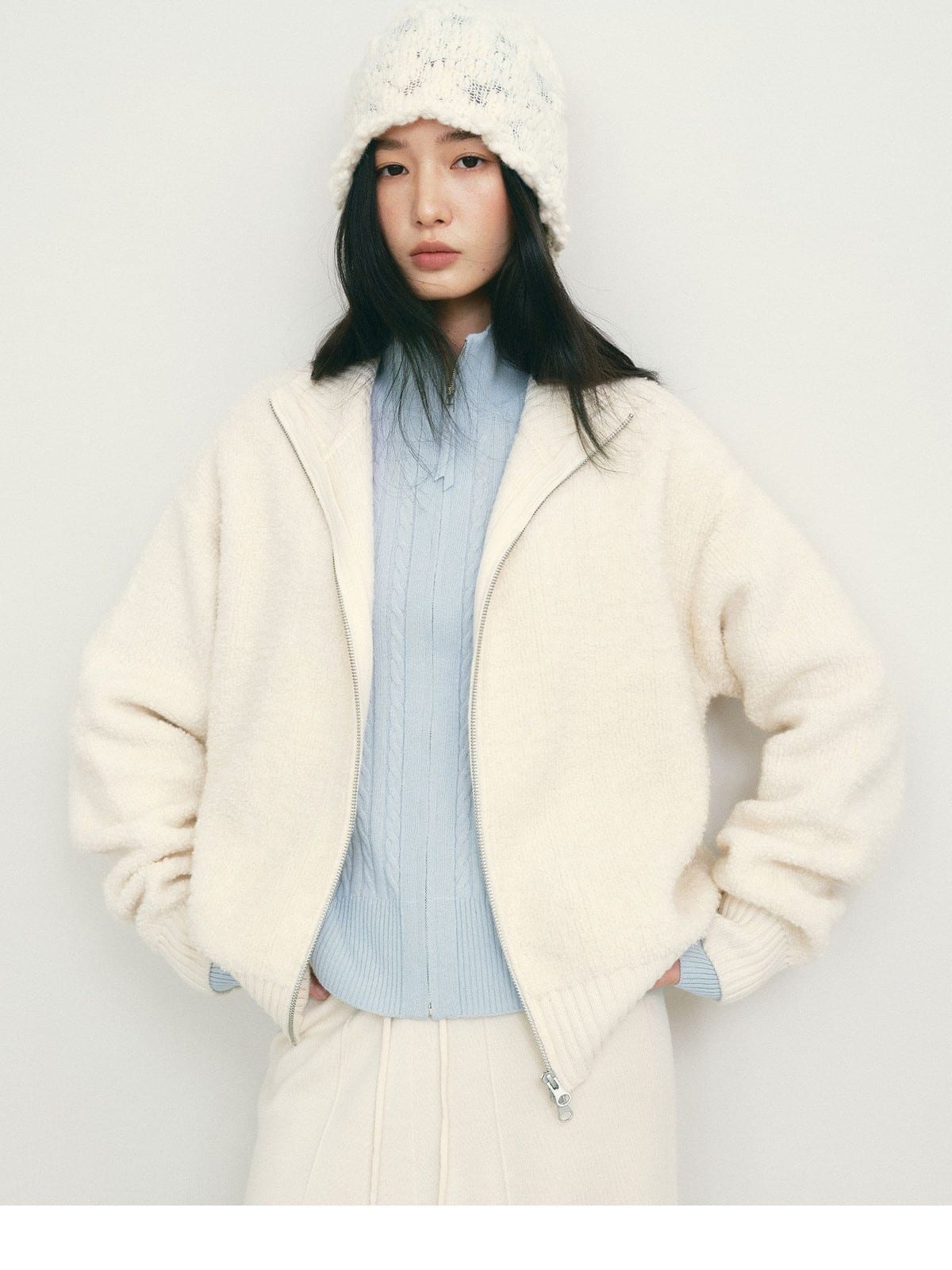 TEASEL Merino Wool Boucl Zip Cardigan in White - On Female Model