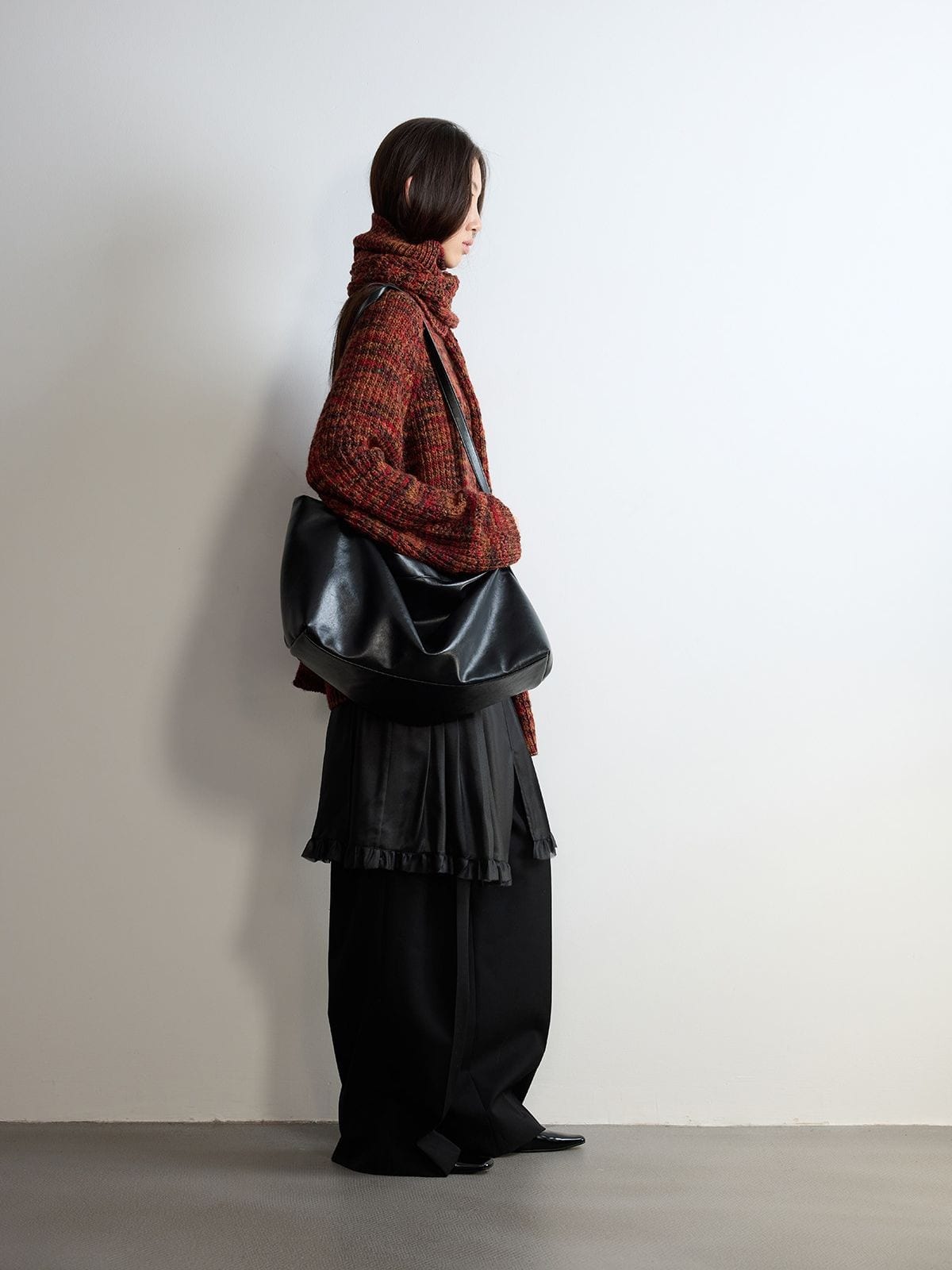 Random Piece Pleated Merino Wool Wide Leg Trousers in Black - On Female Model