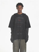 MASONPRINCE Distressed Typographic Cotton T Shirt in Black - On Male Model