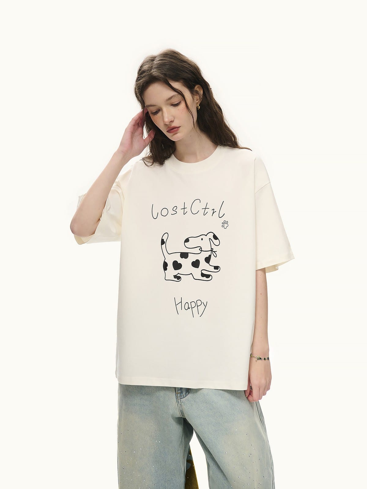 LOSTCTRL Spotted Dog Graphic Crewneck T Shirt in White - On Female Model