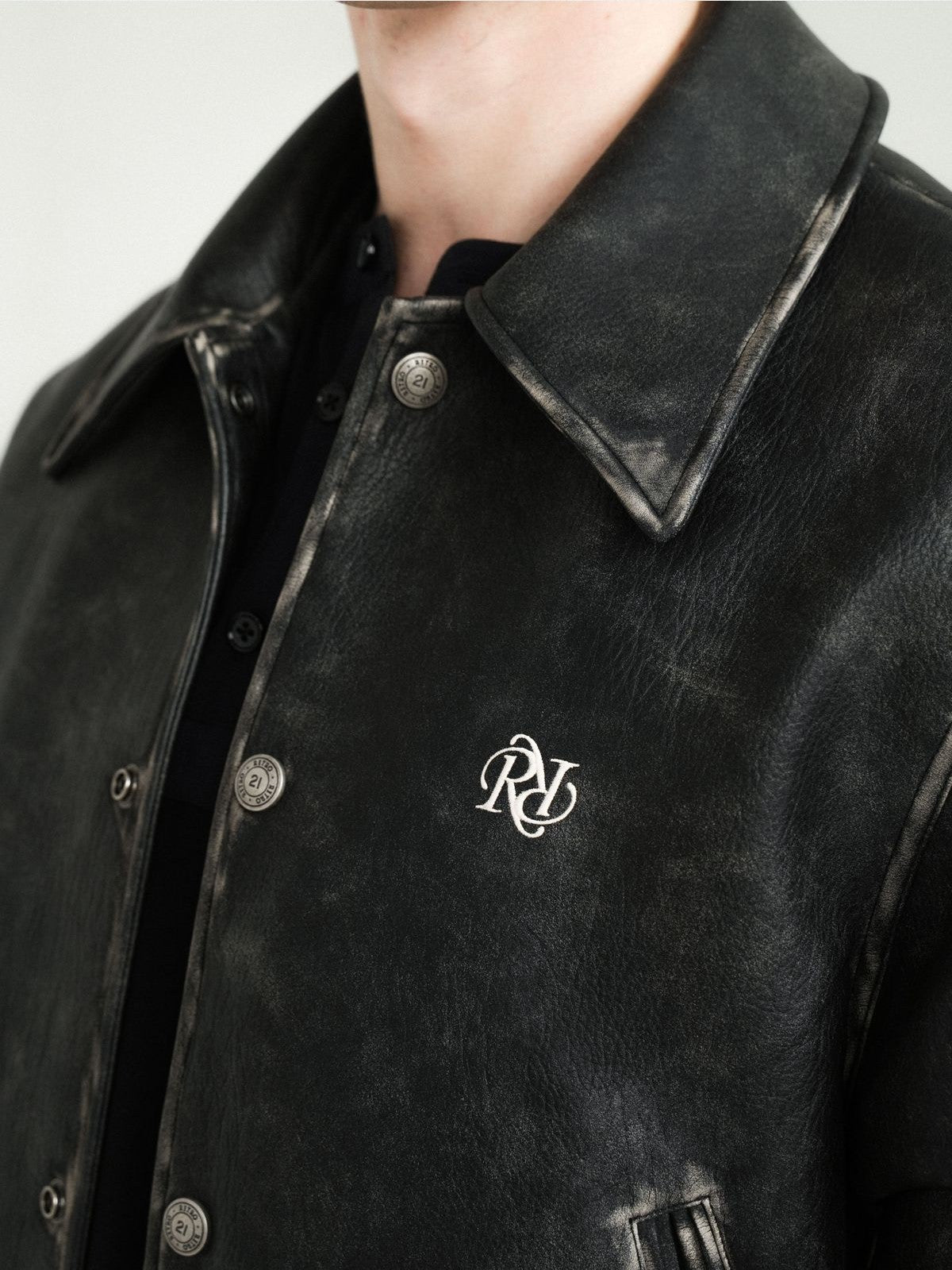 Retro 21 Distressed Faux Leather Padded Jacket in Black - On Model