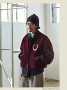 USAGE Reversible Velvet Leather Varsity Jacket in Navy Blue - On Male Model