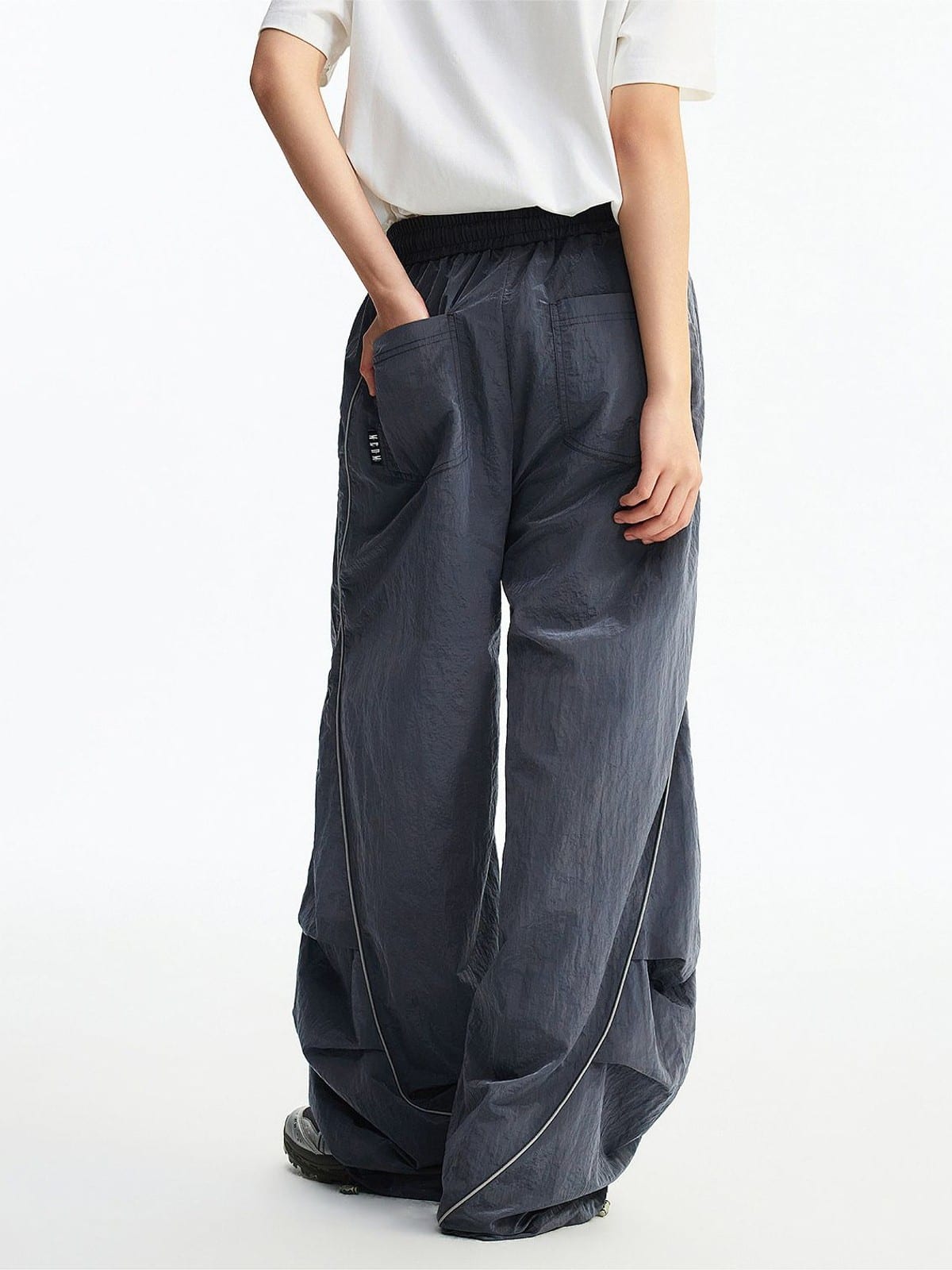 MEDM Glossy Piped Techwear Track Pants in Gray - On Model