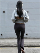 RARELY ALIKE Low Rise Layered Flared Yoga Pants in Gray - On Model