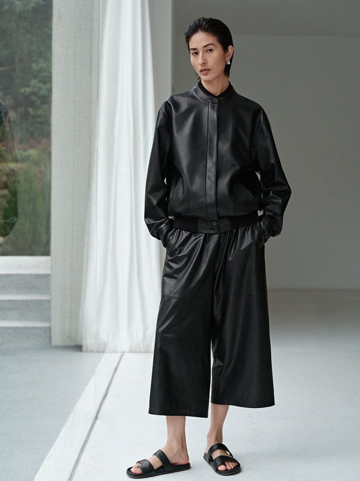 MSBEAST Sheepskin Leather Bomber Jacket in Black - On Female Model