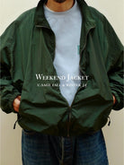 USAGE Lightweight Nylon Zip Up Jacket in Green - On Male Model