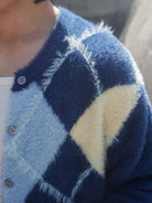 Retro 21 Faux Mink Argyle Cardigan in Blue - On Model