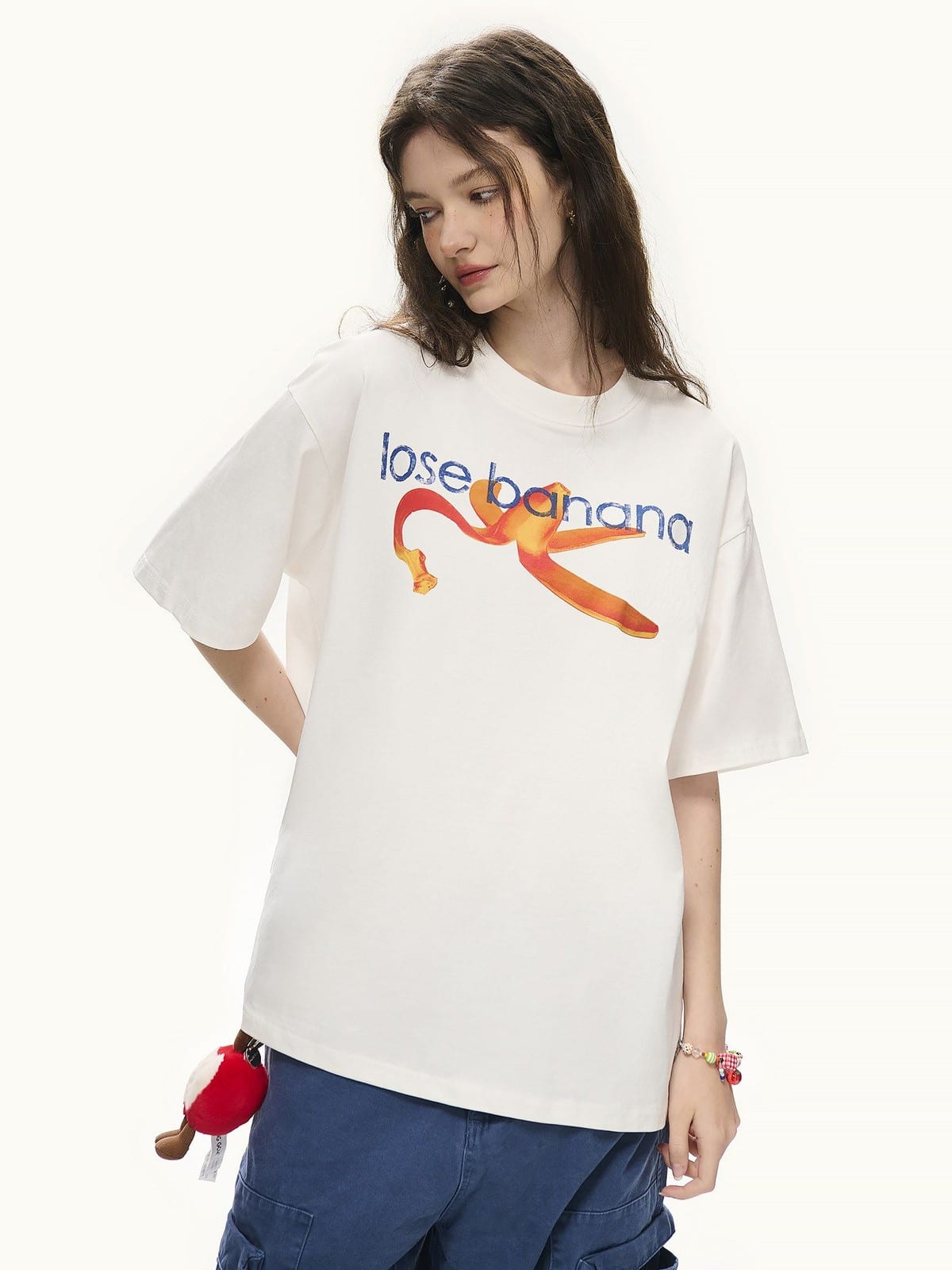 LOSTCTRL Distressed Banana Print Sorona T Shirt in White - On Female Model