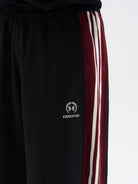 BLINDNOPLAN Raw Edge Contrast Paneled Sweatpants in Black - On Model