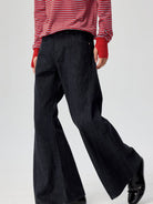 SIMPLE PROJECT Raw Selvedge Boot Cut Jeans in Navy - On Model
