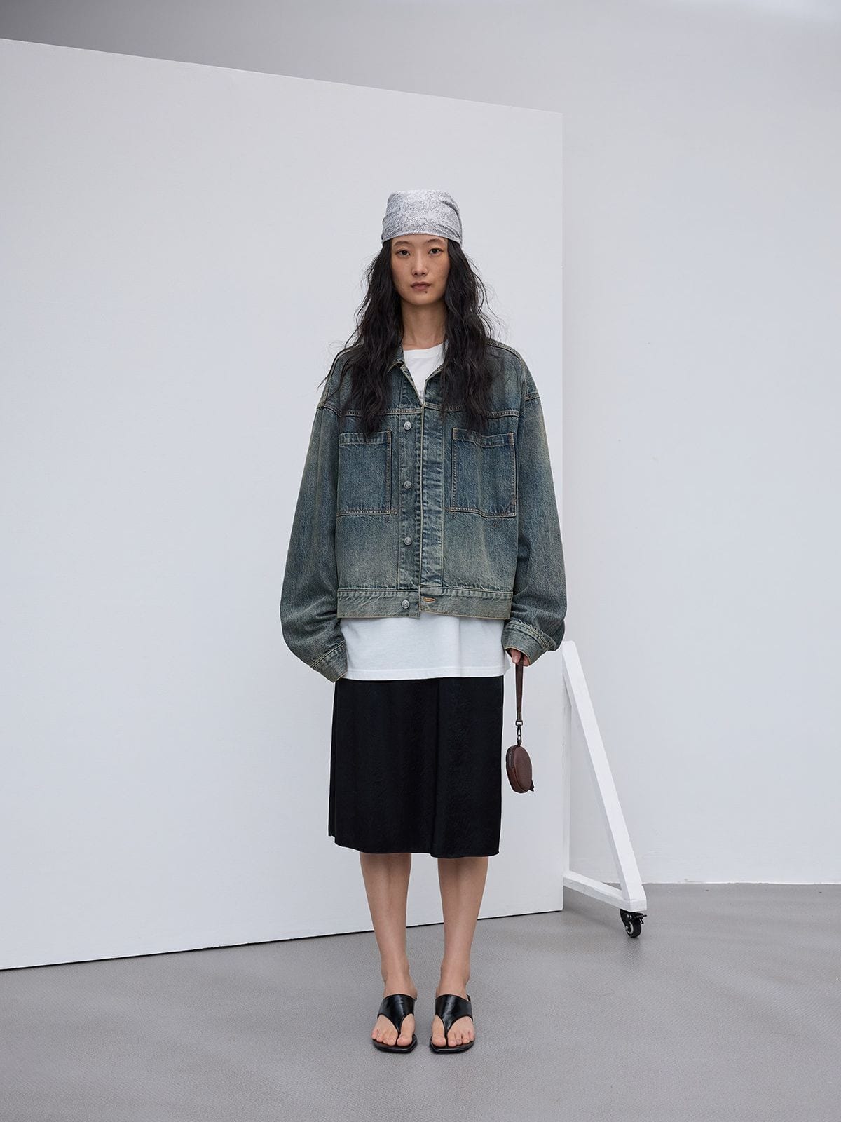 Random Piece Washed Cotton Cropped Denim Jacket in Denim - On Female Model