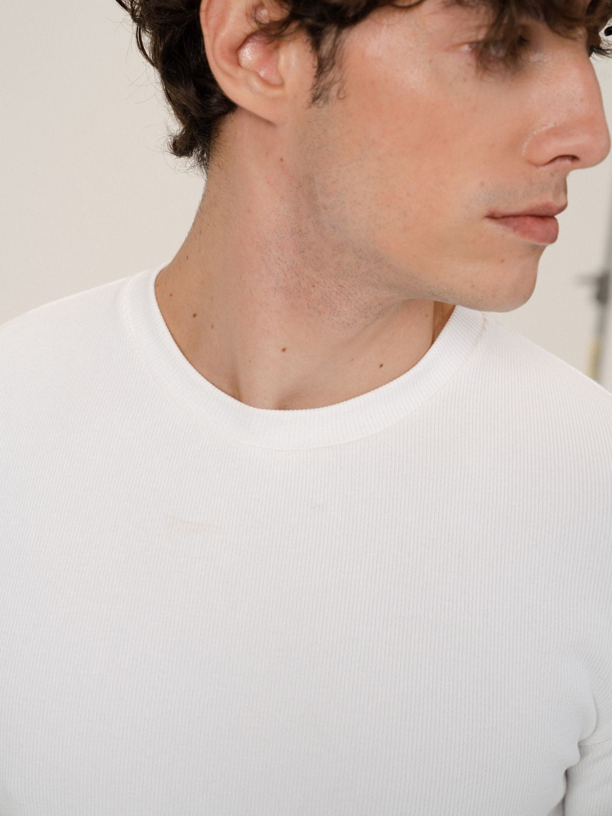 Retro 21 Ribbed Cotton Crew Neck T Shirt in White - On Male Model