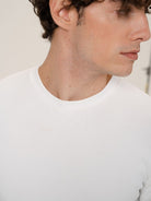 Retro 21 Ribbed Cotton Crew Neck T Shirt in White - On Male Model