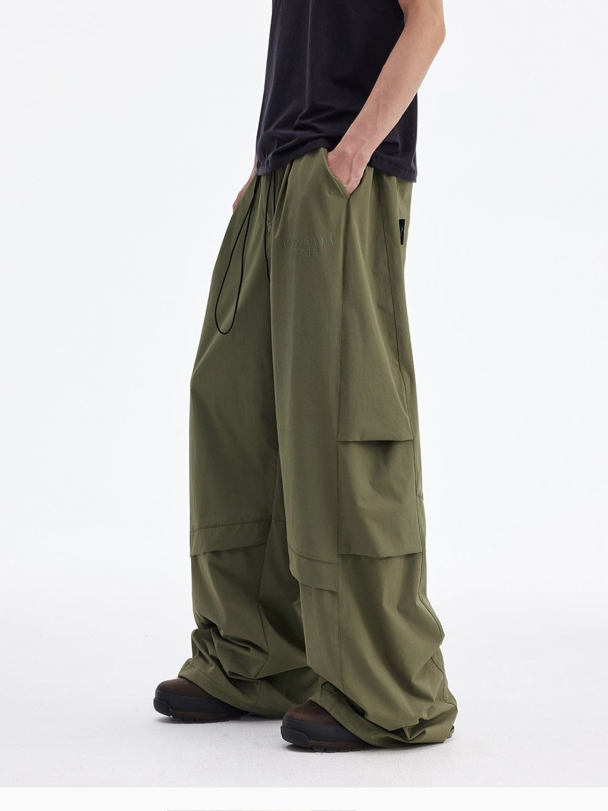 MEDM Crinkled Nylon Parachute Cargo Pants in Olive - On Male Model