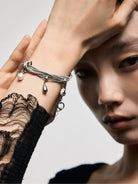 BLACKHEAD Multi Chain Teardrop Pearl Bracelet in Silver - On Female Model
