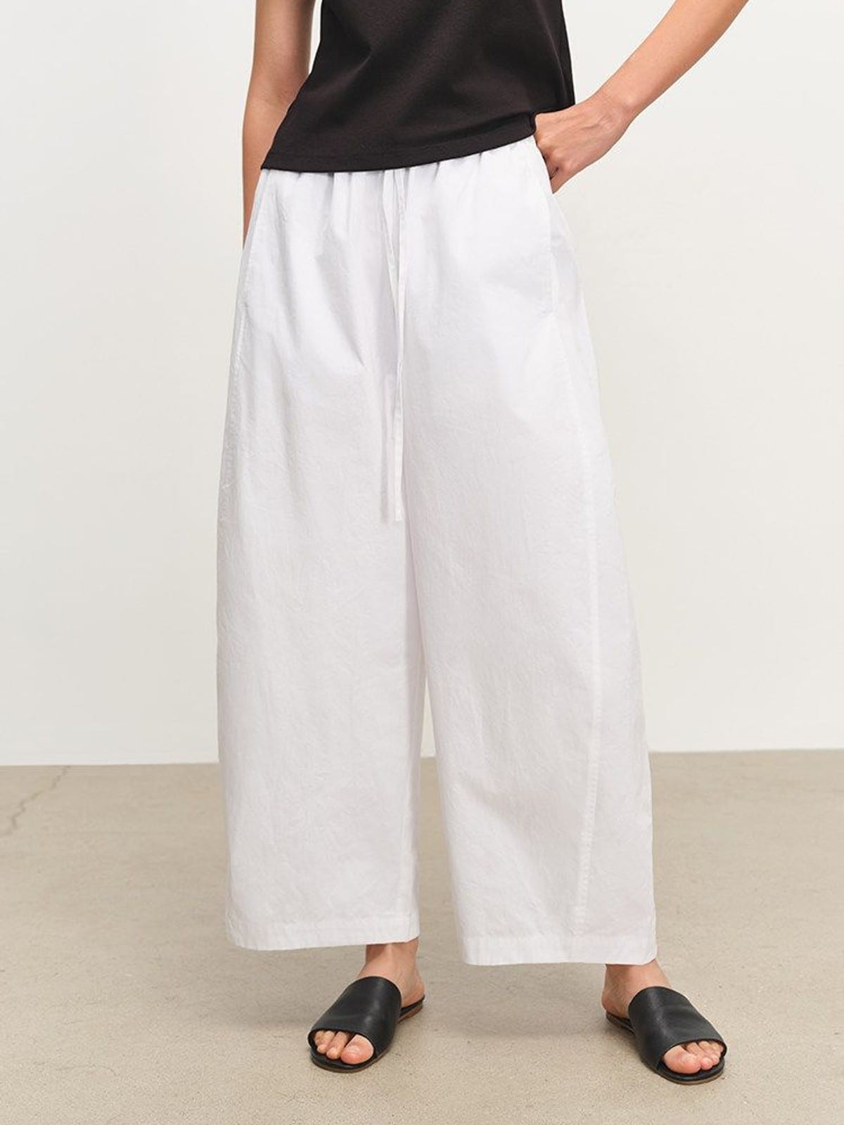 MSBEAST Paper Texture Cotton Balloon Pants in White - On Female Model