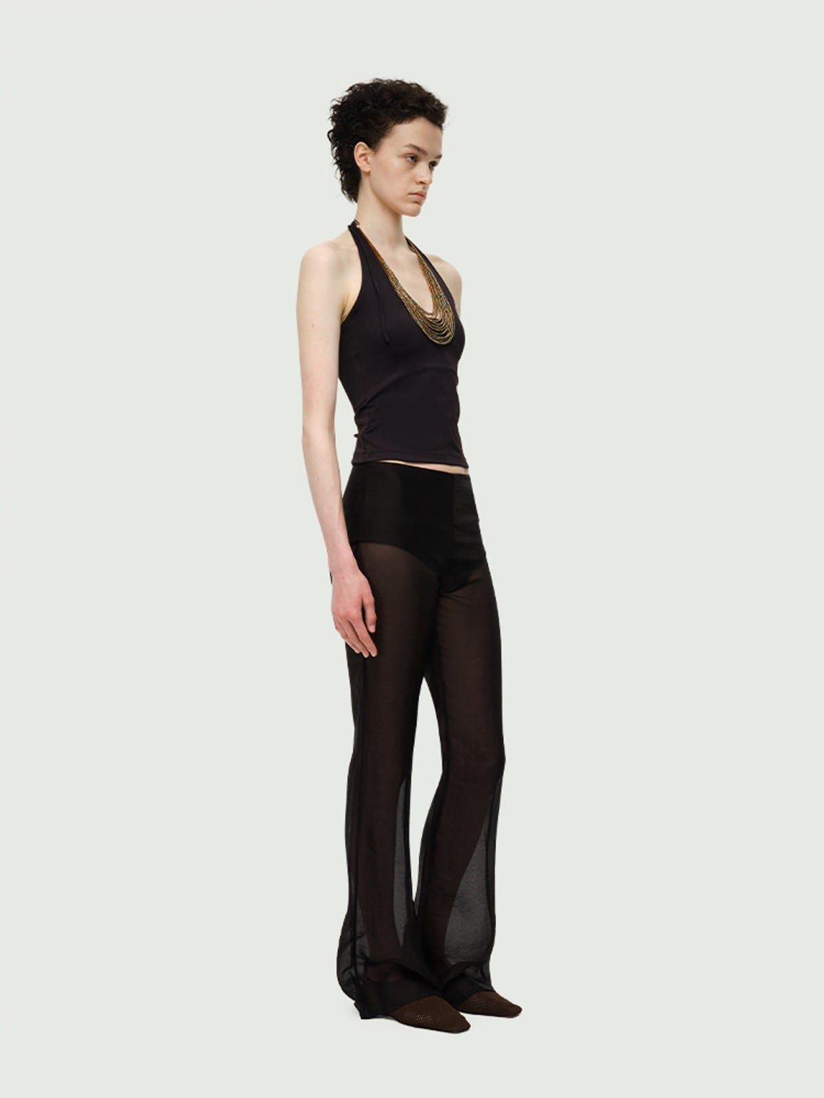 RARELY ALIKE Semi Sheer Mesh Flared Pants in Black - On Female Model