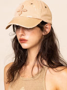 SMFK Distressed Cross Embroidered Baseball Cap in Beige - On Female Model