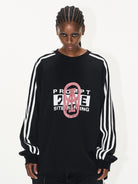 BLINDNOPLAN Color Block Graphic Raglan Sweatshirt in Black - On Female Model