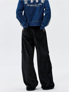 MEDM Wide Leg Parachute Cargo Pants in Black - On Model