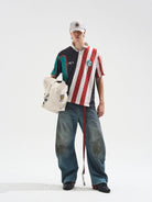 BLINDNOPLAN Digital Print Color Block Jersey Polo in Black - On Male Model