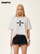 SMFK Cross Graphic Cotton T Shirt in White - On Female Model