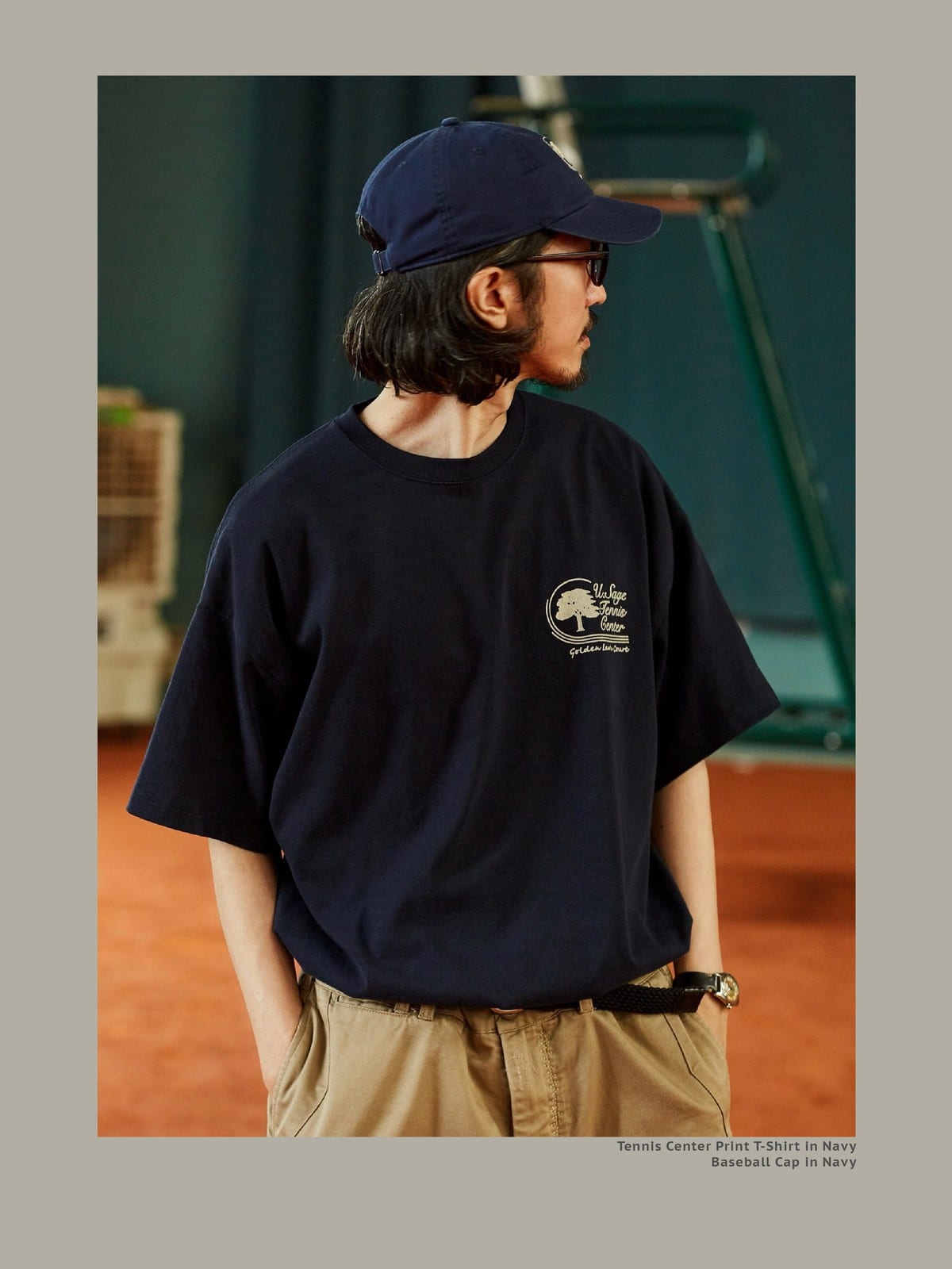USAGE Retro Tennis Graphic Cotton T Shirt in Navy Blue - On Male Model