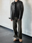 Roolrren homme Vegetable Tanned Sheepskin Shirt Jacket in Black - On Male Model
