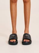 SMFK Cowhide Leather Cross Hardware Slides in Black - On Female Model