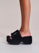 SMFK Cross Hardware Shearling High Heel Mules in Black - On Female Model
