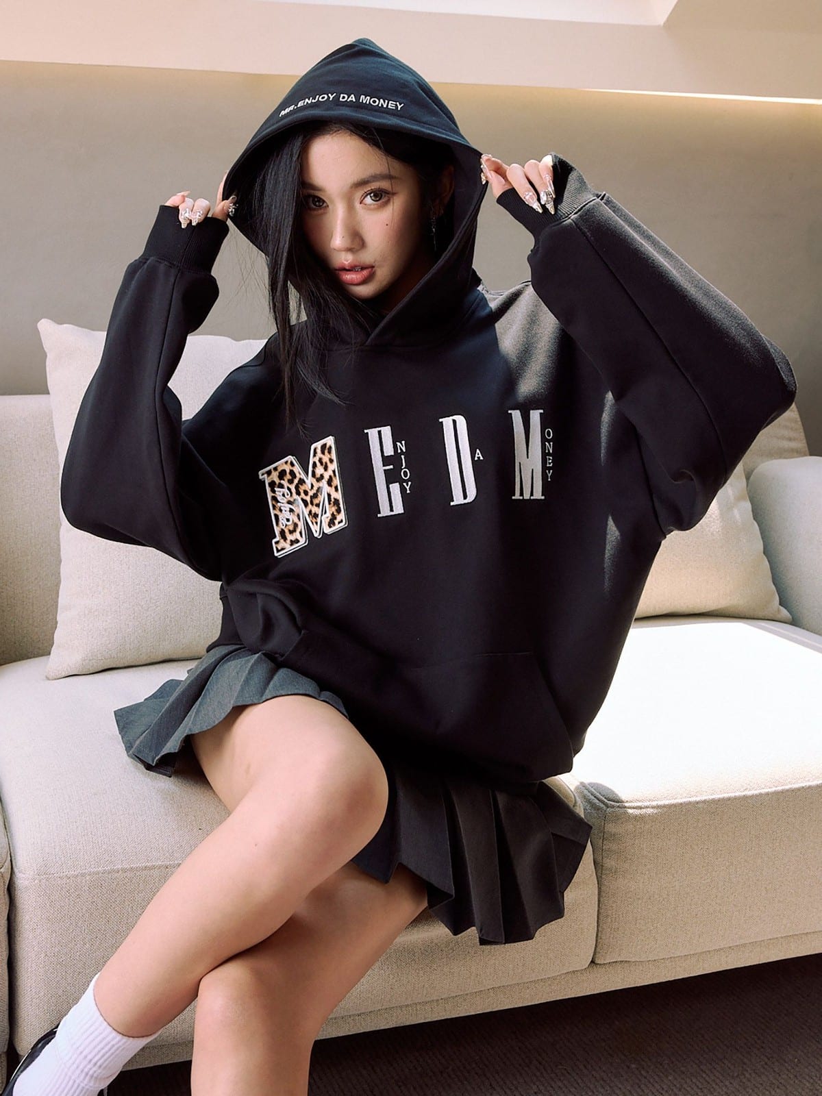 MEDM Animal Print Logo Pullover Hoodie in Black - On Female Model