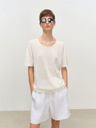 MSBEAST Rolled Edge Silk Cotton U Neck T Shirt in White - On Female Model