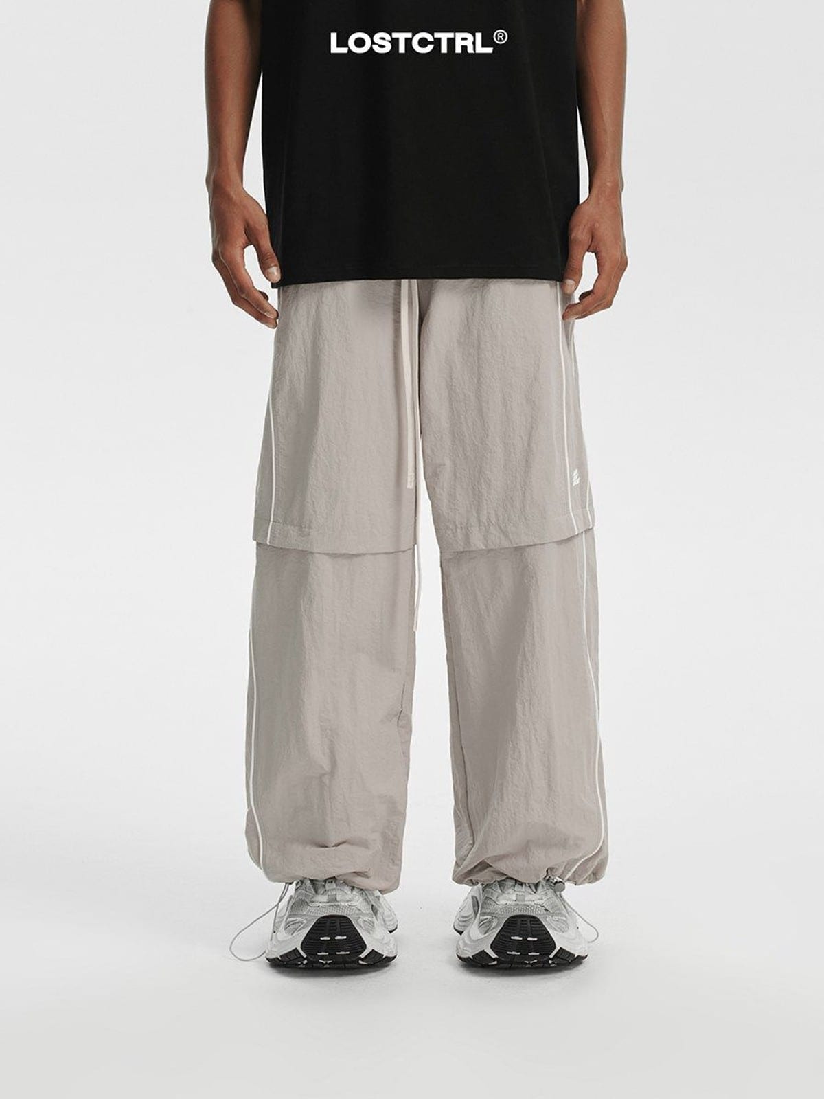 LOSTCTRL Contrast Piping Nylon Trousers in Gray - On Model