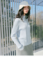 TEASEL Wool Cable Knit Zip Cardigan in Sky Blue - On Female Model