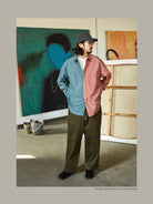 USAGE Hand Distressed Patched Chinos in Olive - On Male Model