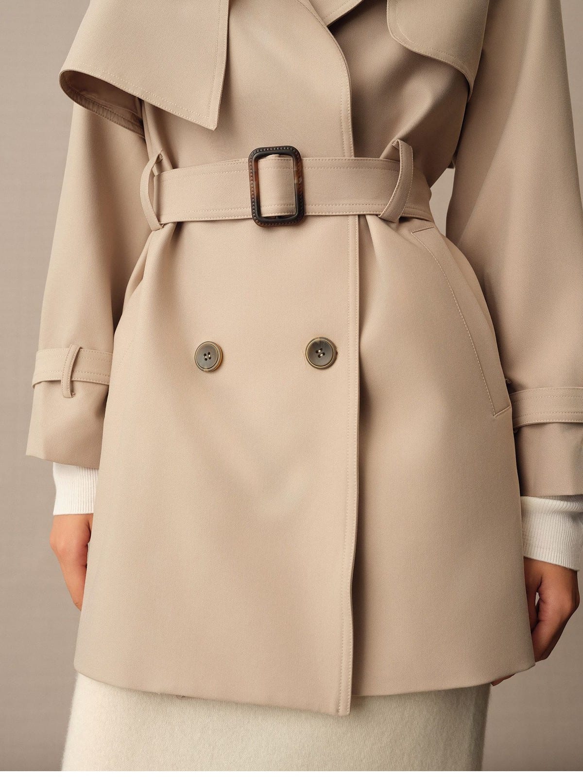 TEASEL Double Breasted Belted Trench Coat in Beige - On Female Model