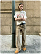 VLABMADE Resin Crinkled Micro Flare Jeans in Beige - On Male Model